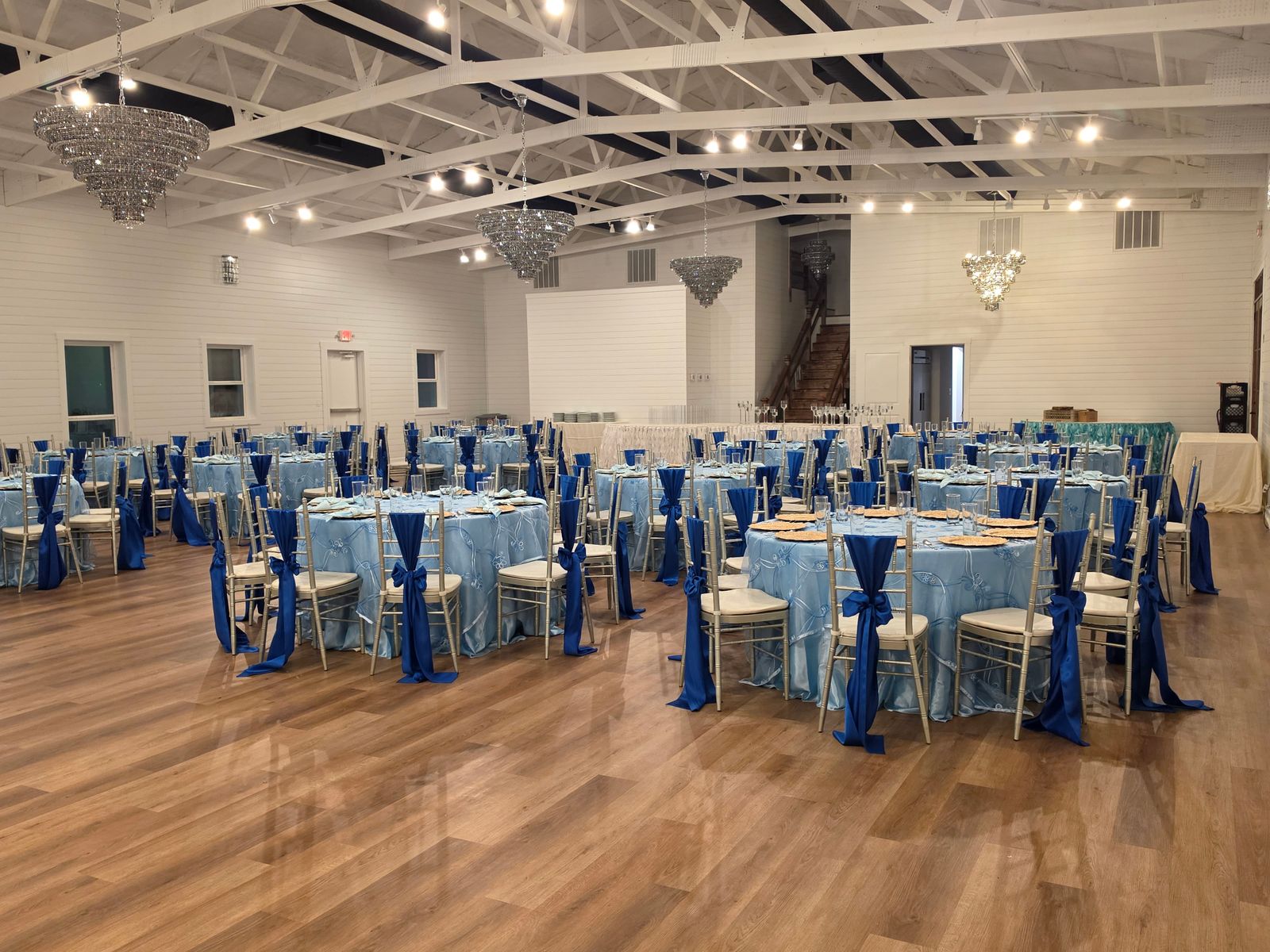 Ballroom set with blue linens for a large private event