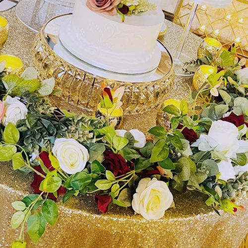 Gold cake table with florals