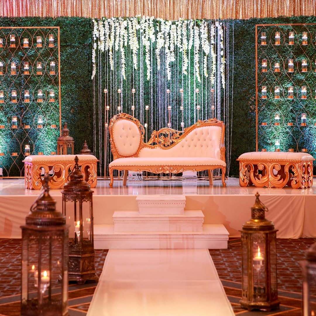 Gold ceremony stage with lanterns