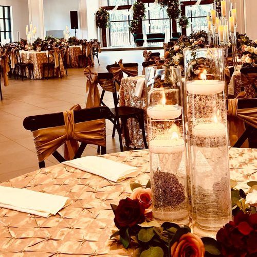 Rustic luxury reception with wood chairs