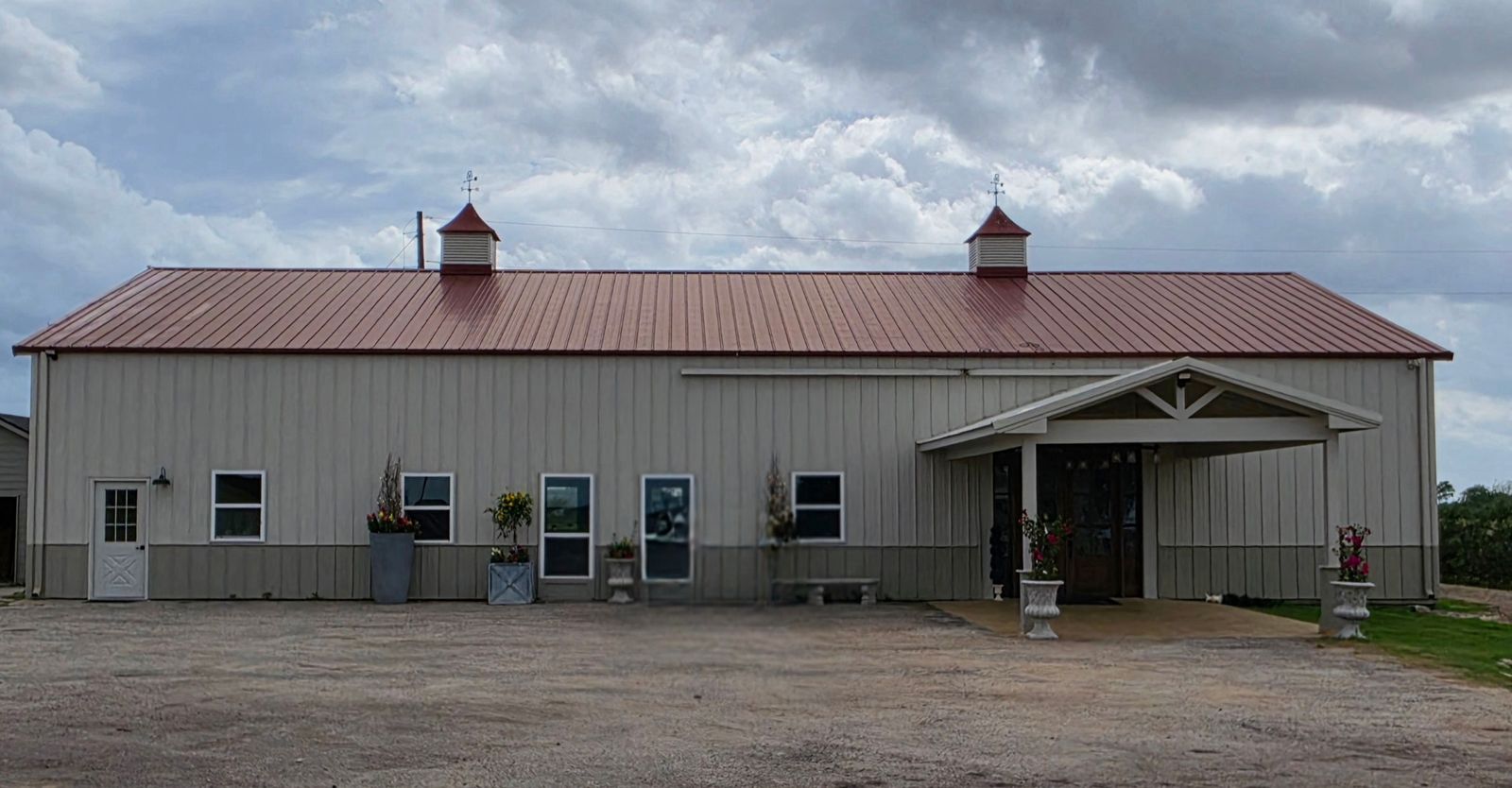 Exterior of the event center with a covered entrance