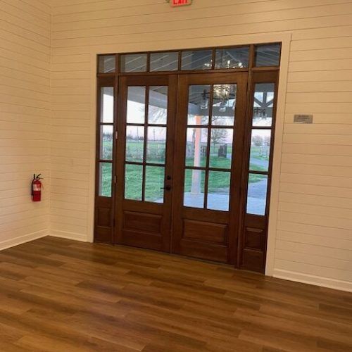 Tall wood and glass entrance doors